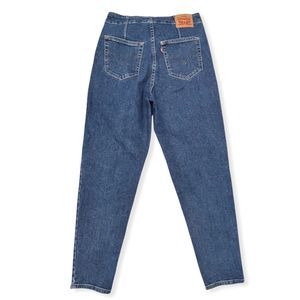 Levi's Hollywood High Rise Tapered Jeans.